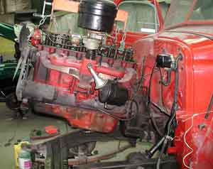 Pulling the engine on a 1946 Chevy 1/2 ton at Adler's Antique Autos, Stephentown, NY